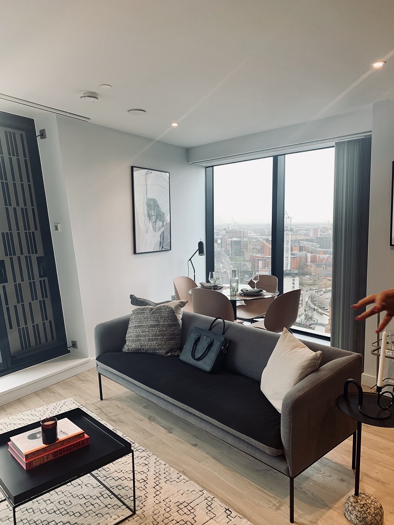 Some of the flats have dual aspect windows, showing two sides of Manchester