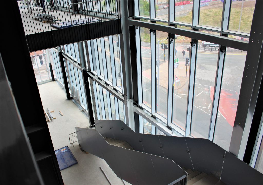The feature staircase was installed in three sections