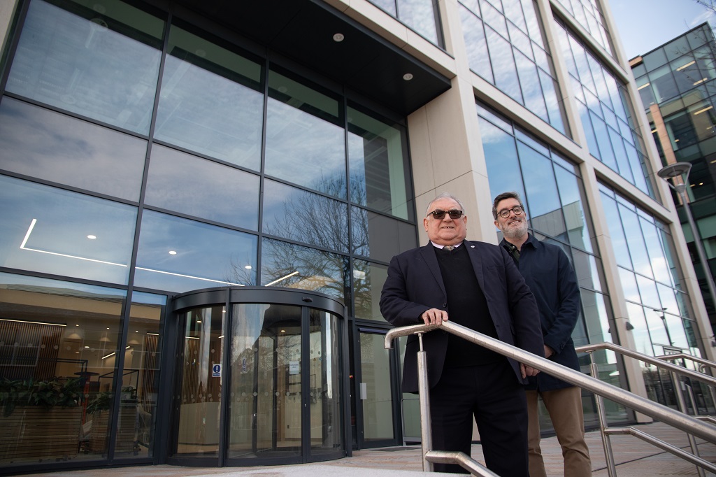 Cllr Colin MacAllister and Tom Webber outside Stockport Exchange, p Font Comms