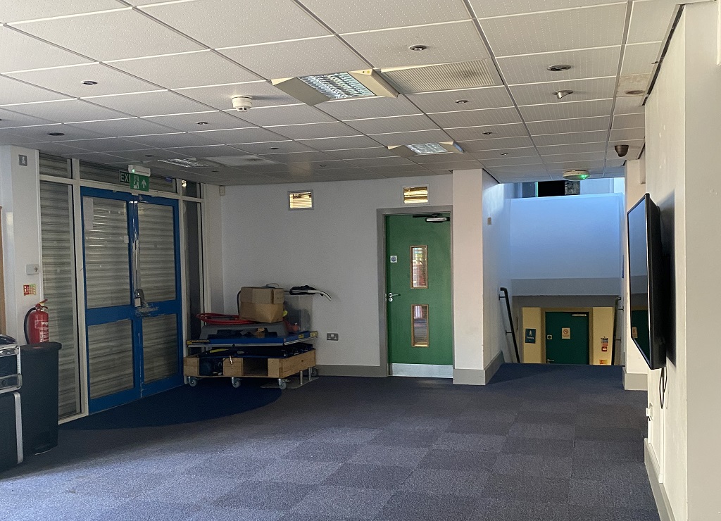 Before: the lobby and reception area. Credit: K2 Architects