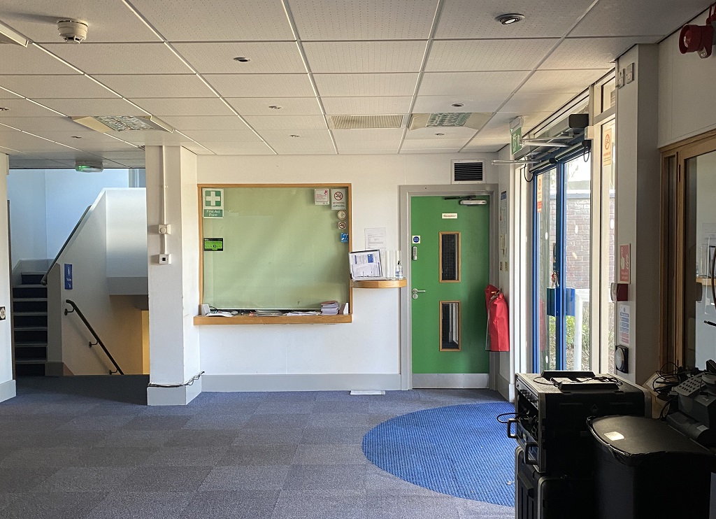 Before: the lobby and reception area. Credit: K2 Architects