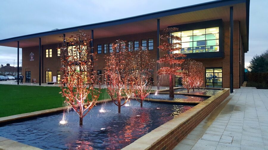 Hope University health science building pond