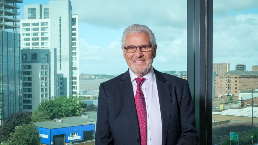 Hugh Frost in front of KET, Beetham, p Merrion Strategy