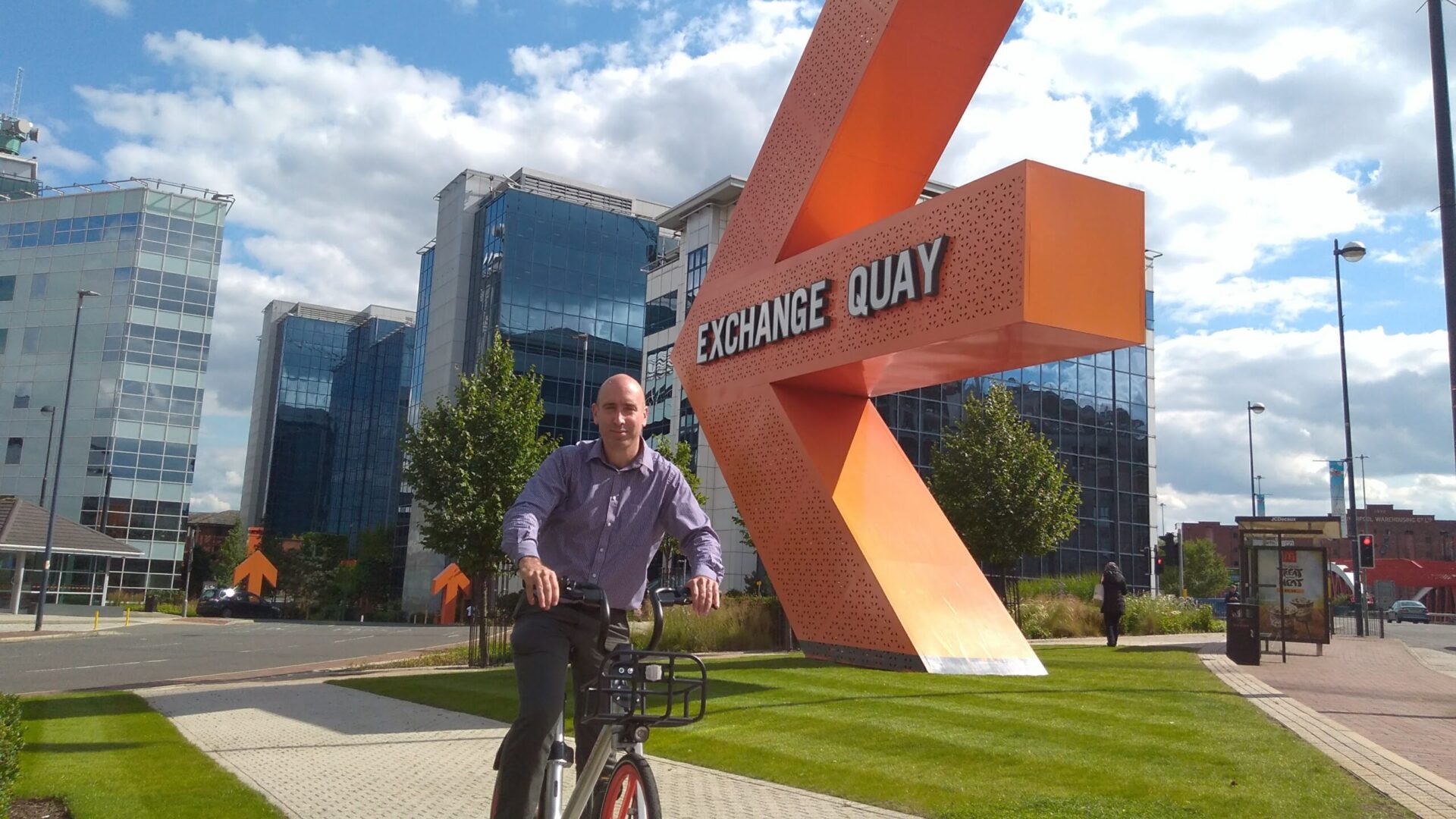Iain Roberts on a Mobike at Exchange Quay