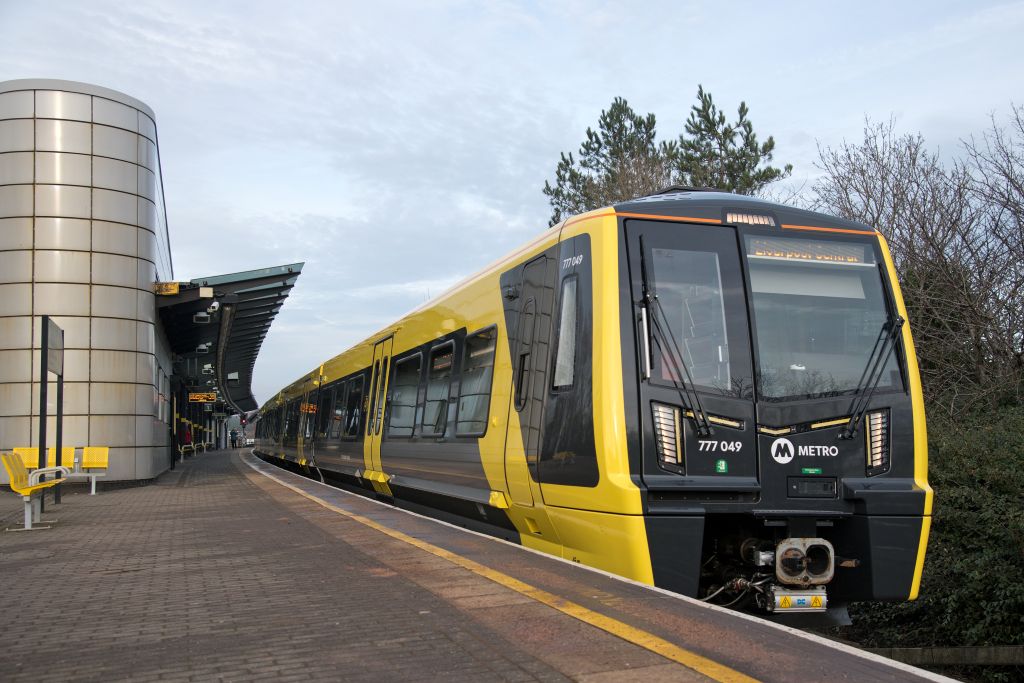 Merseyrail train at Sandhills, Merseyrail, p Liverpool City Region Combined Authority