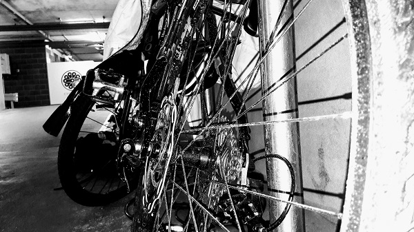 black and white photo of a bike in a Manchester underground car park